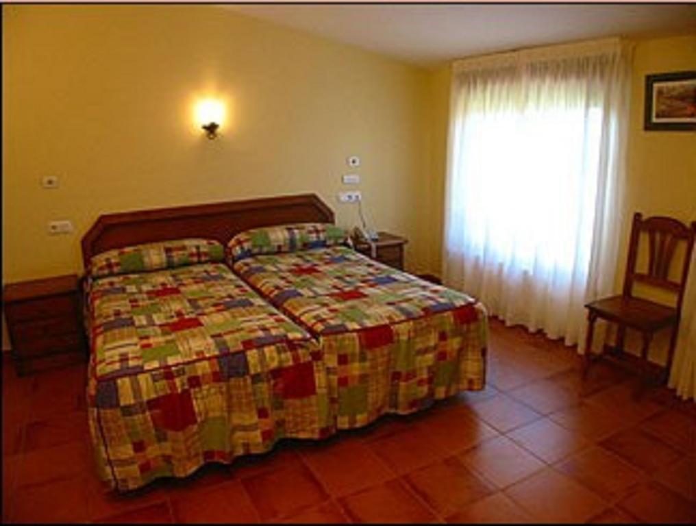 Hospedería El Cantio Orena Quarto foto